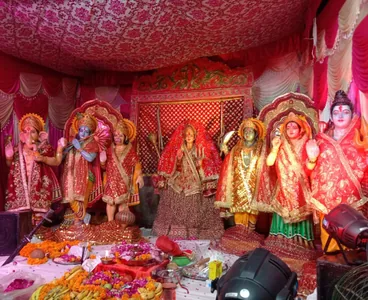 Mata Ki Chowki stage with pink drapes and flowers